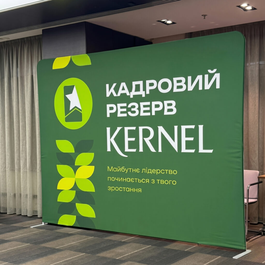 Kernel HR brand identity applied across email template, recruitment banner and event stand for the talent pool program